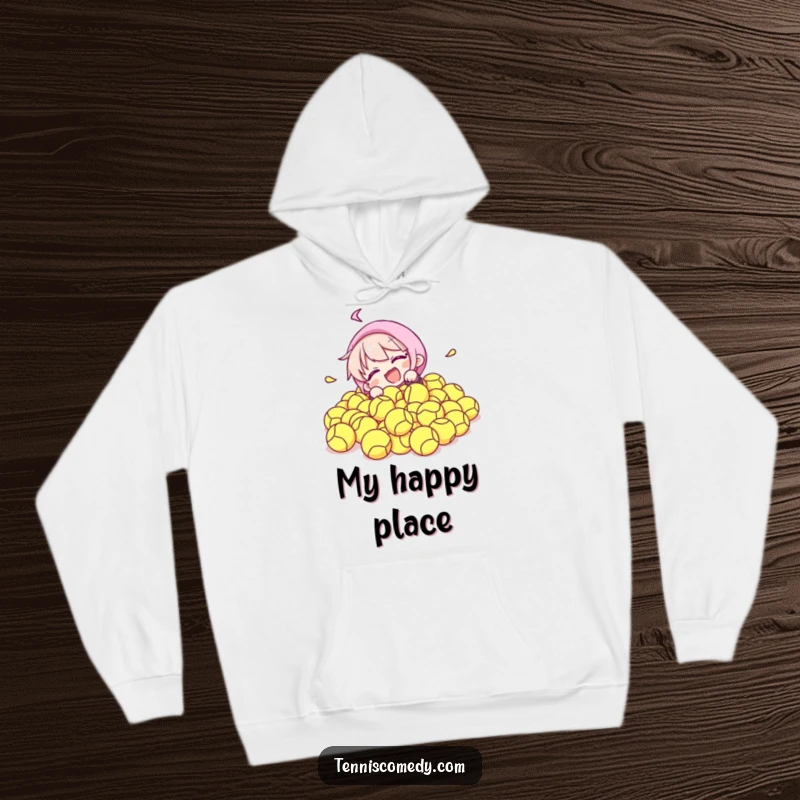 Funny hoodie visualizing a character comically falling into a delightful pile of tennis balls, perfect for cozying up with humor.