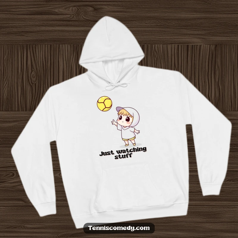 Funny hoodie with a cartoon tennis player tossing a tennis ball high and intently watching its spin. Comfortable and artistic sports wear.