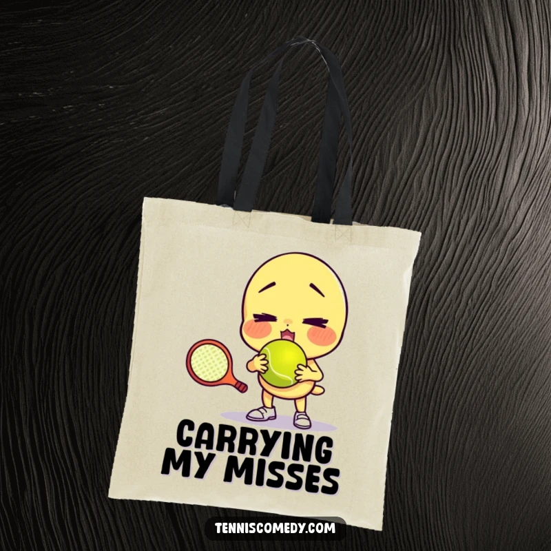 Funny tote bag with a character comically failing to serve a tennis ball with a funny face, perfect for carrying essentials with humor and as a gift.